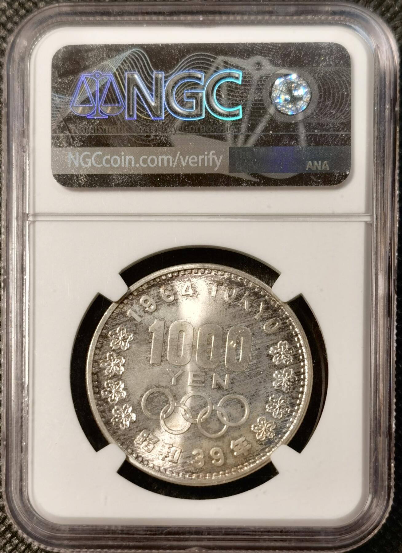 甄臻铺-世界币章拍卖（第30期），送拍享返佣金等优惠多多 NGC-MS66 日本 1964年 大奥1000日元银币 正面淡黄油包浆
