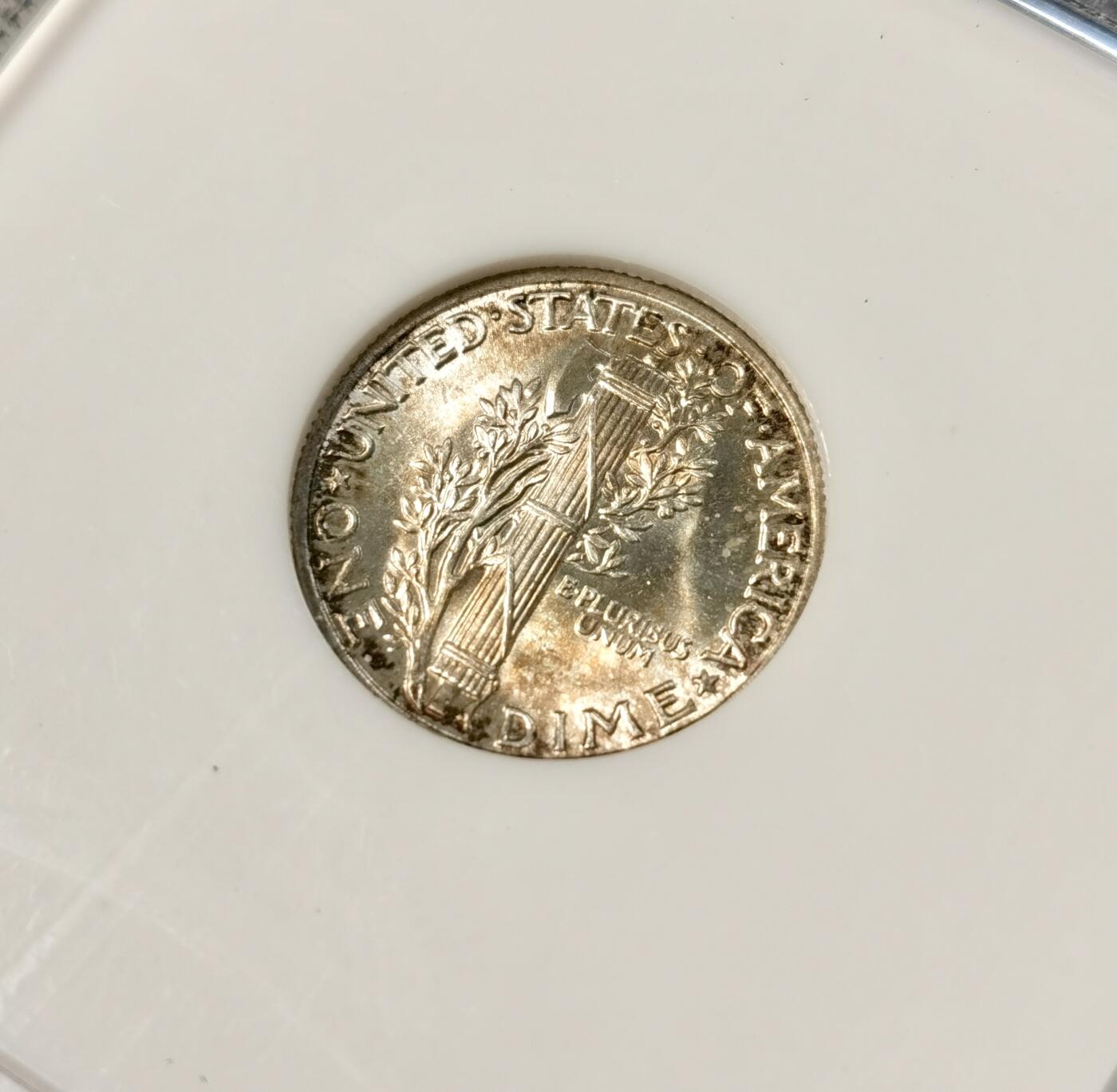 甄臻铺-世界币章拍卖（第30期），送拍享返佣金等优惠多多 NGC-MS65FB 1944年美国小飞侠，金色包浆，少见FB后缀