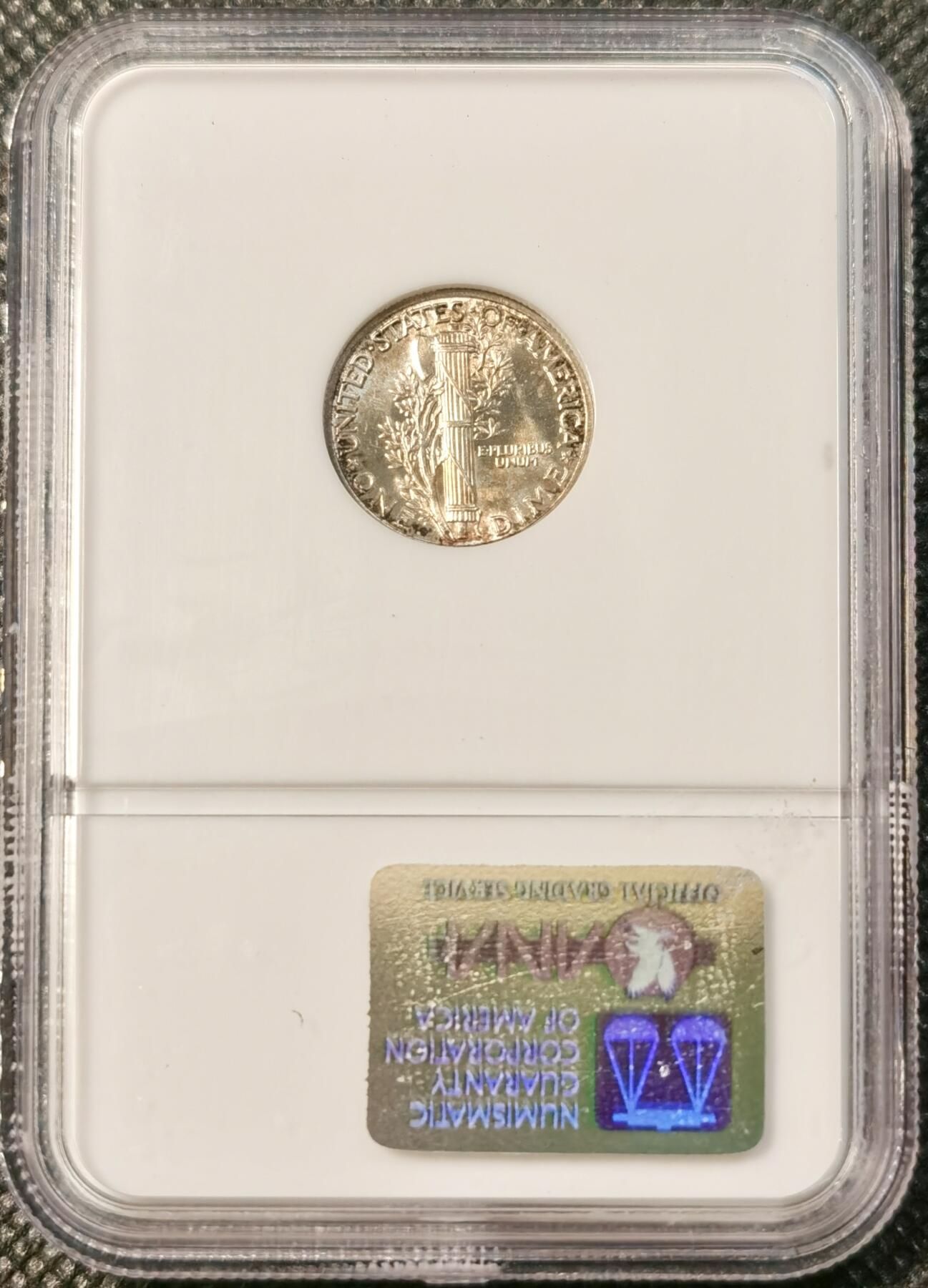 甄臻铺-世界币章拍卖（第30期），送拍享返佣金等优惠多多 NGC-MS65FB 1944年美国小飞侠，金色包浆，少见FB后缀