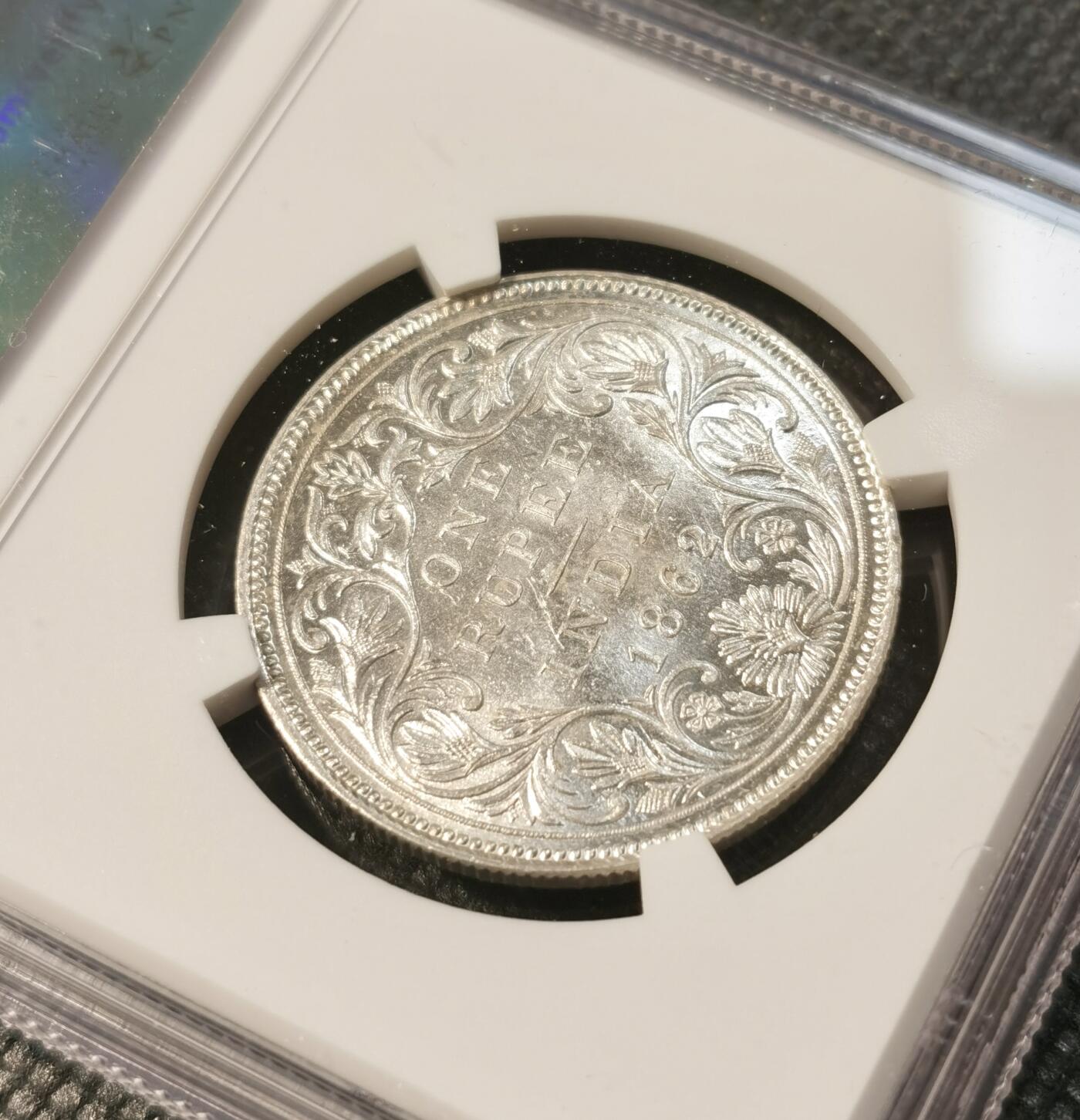 甄臻铺-世界币章拍卖（第30期），送拍享返佣金等优惠多多 NGC-MS62 1862年英属印度维多利亚卢比