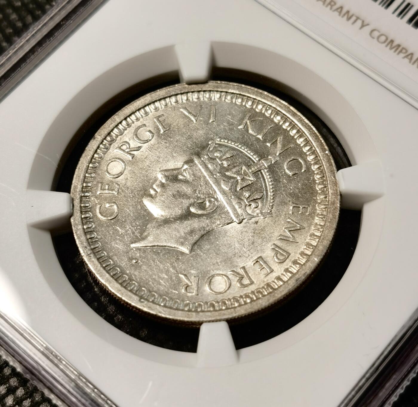 甄臻铺-世界币章拍卖（第30期），送拍享返佣金等优惠多多 NGC -MS63 英属印度1945乔六1卢比