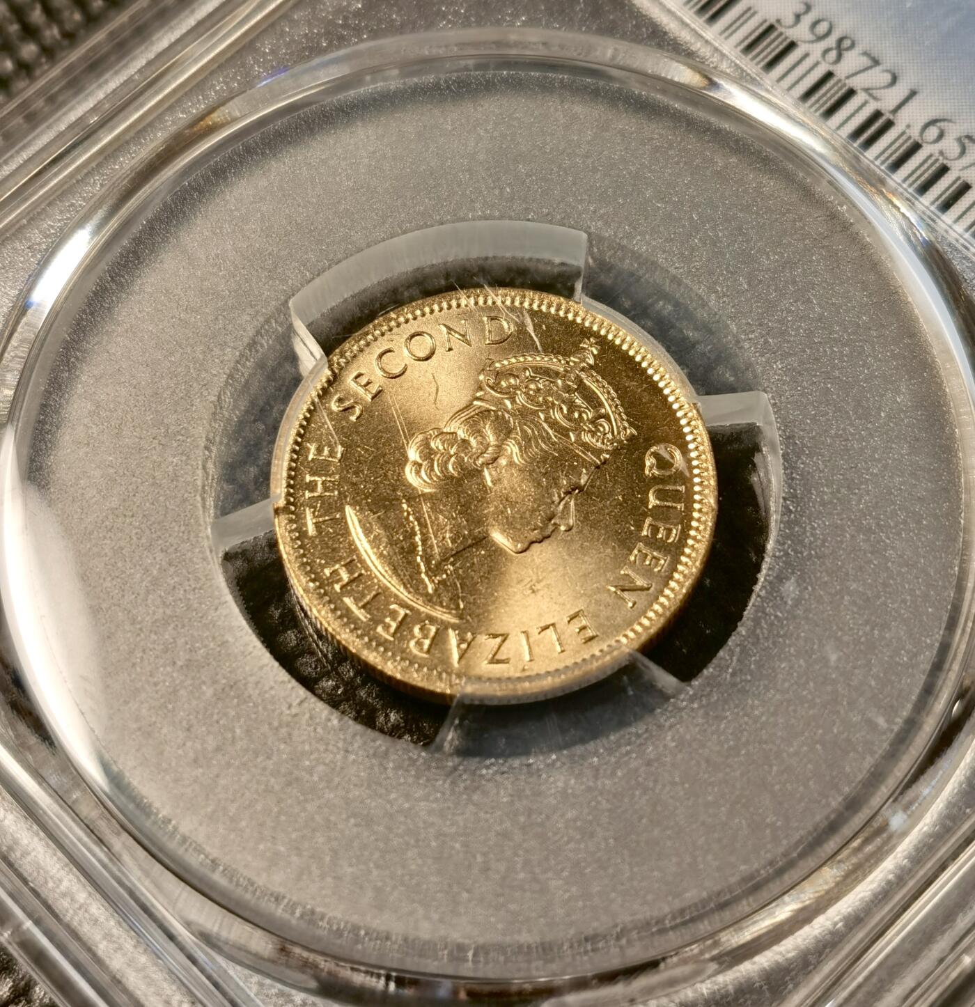 甄臻铺-世界币章拍卖（第30期），送拍享返佣金等优惠多多 PCGS-MS65 1978年香港一毫，卷拆