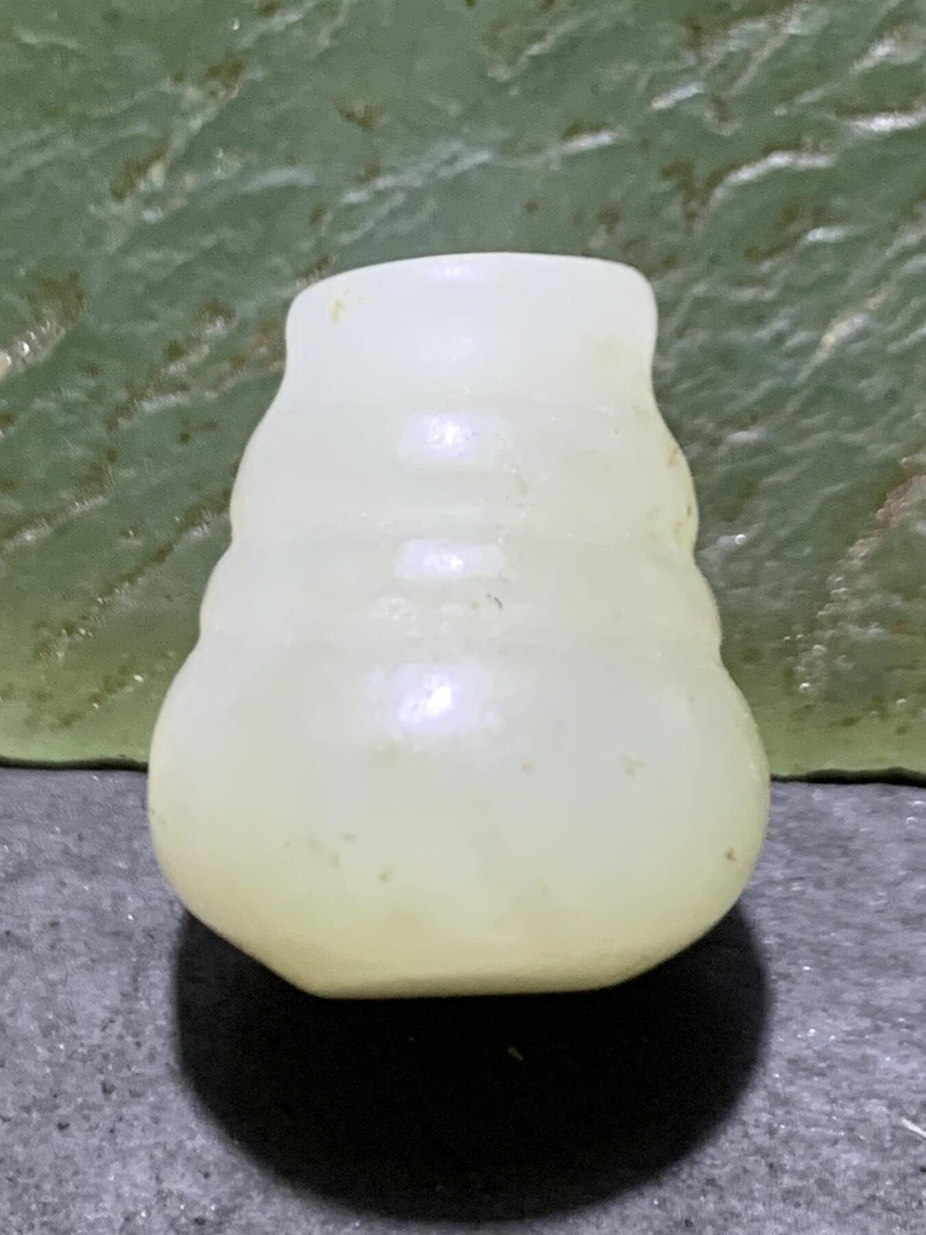 天然水草沁和田玉随形一体佛头三通一个