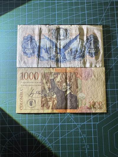 【炜奕收藏】，第四十二期 哥伦比亚1-1000比索，品相如图