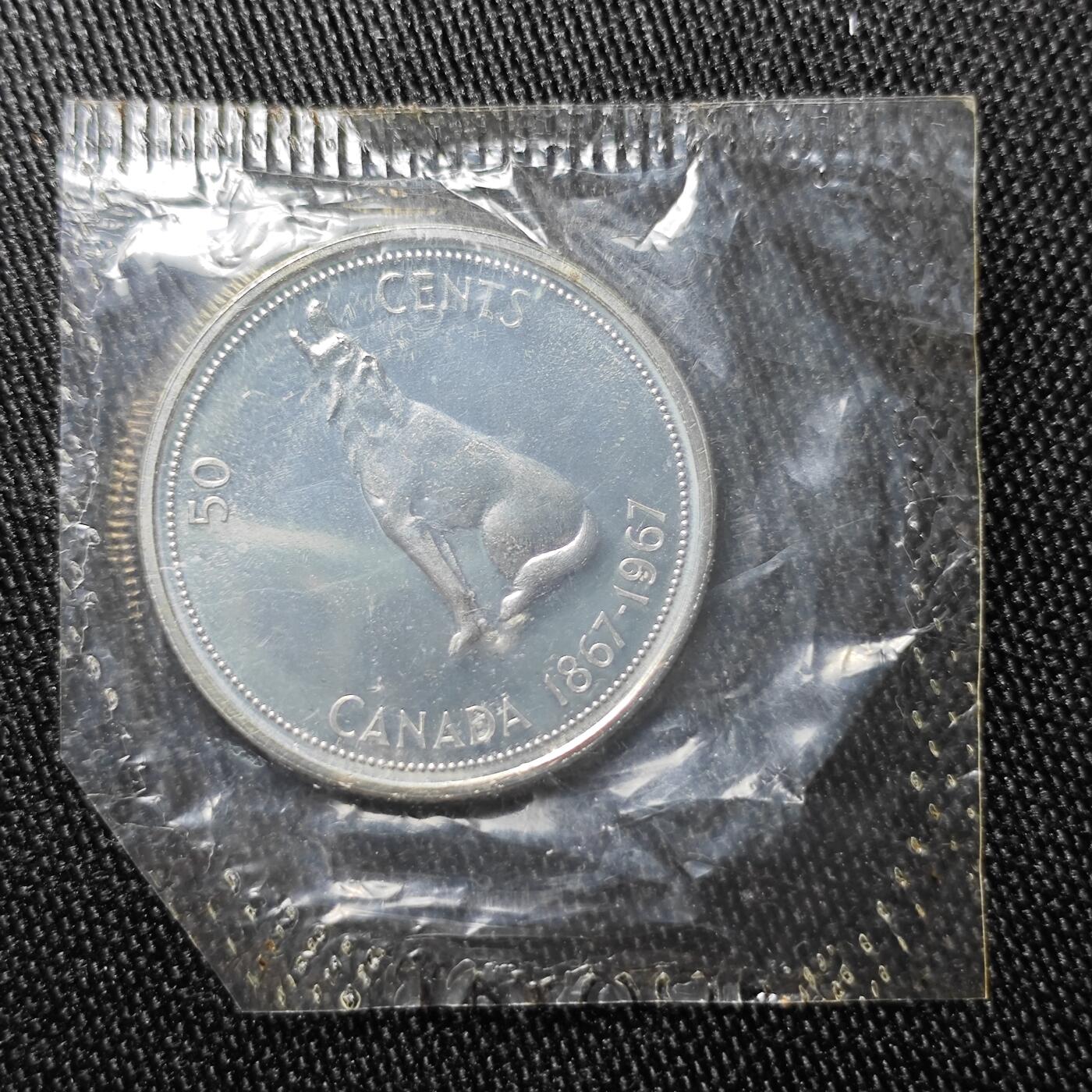 KK钱币收藏小铺 套币 银币专场 2月预留时间 周末发货   1967加拿大50分精制纪念币 加拿大建国100周年纪念 塑封银币！