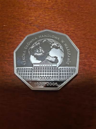 长老汇蛇年精选第三十九场拍卖 2006波兰华沙经济学院百周年10兹罗提九边形精制银币，14.14克925银，克书未记载