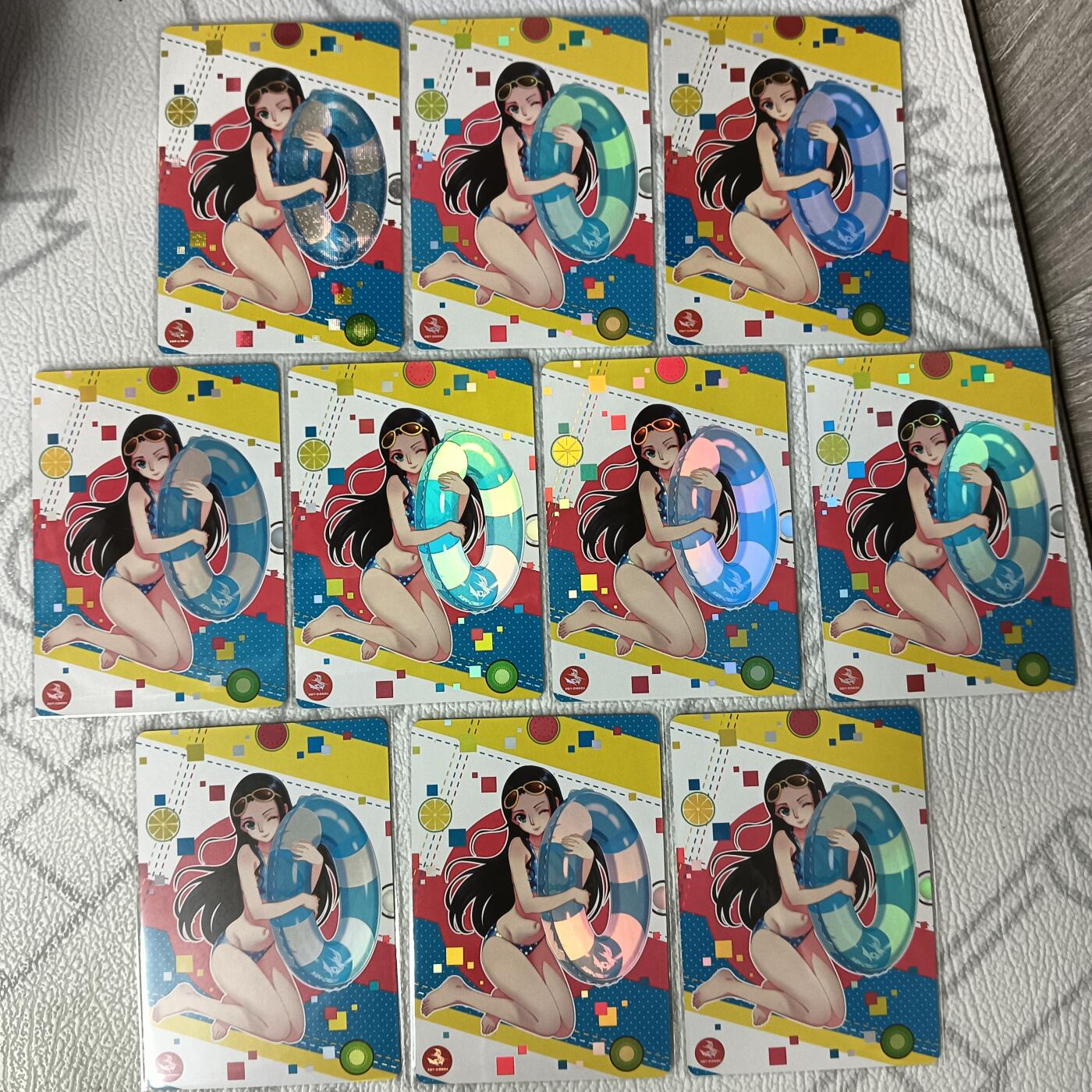 花开卡拍第35期（8月24号周日截拍，品控勿拍!!!拍品不寄存，运费5元，自制卡难免瑕疵，可能存在轻微撞角爆边等出厂瑕疵，品控介意勿拍！） 骁骑营卡牌 联名卡-罗宾 彩闪9宫+纱布1张