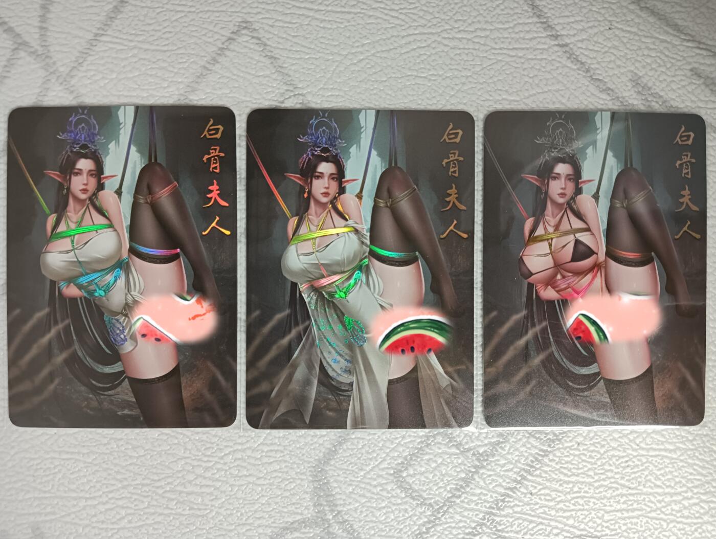 花开卡拍第35期（8月24号周日截拍，品控勿拍!!!拍品不寄存，运费5元，自制卡难免瑕疵，可能存在轻微撞角爆边等出厂瑕疵，品控介意勿拍！） 西游记卡牌 白骨夫人-困帮禁忌 衣服三渐变 彩闪