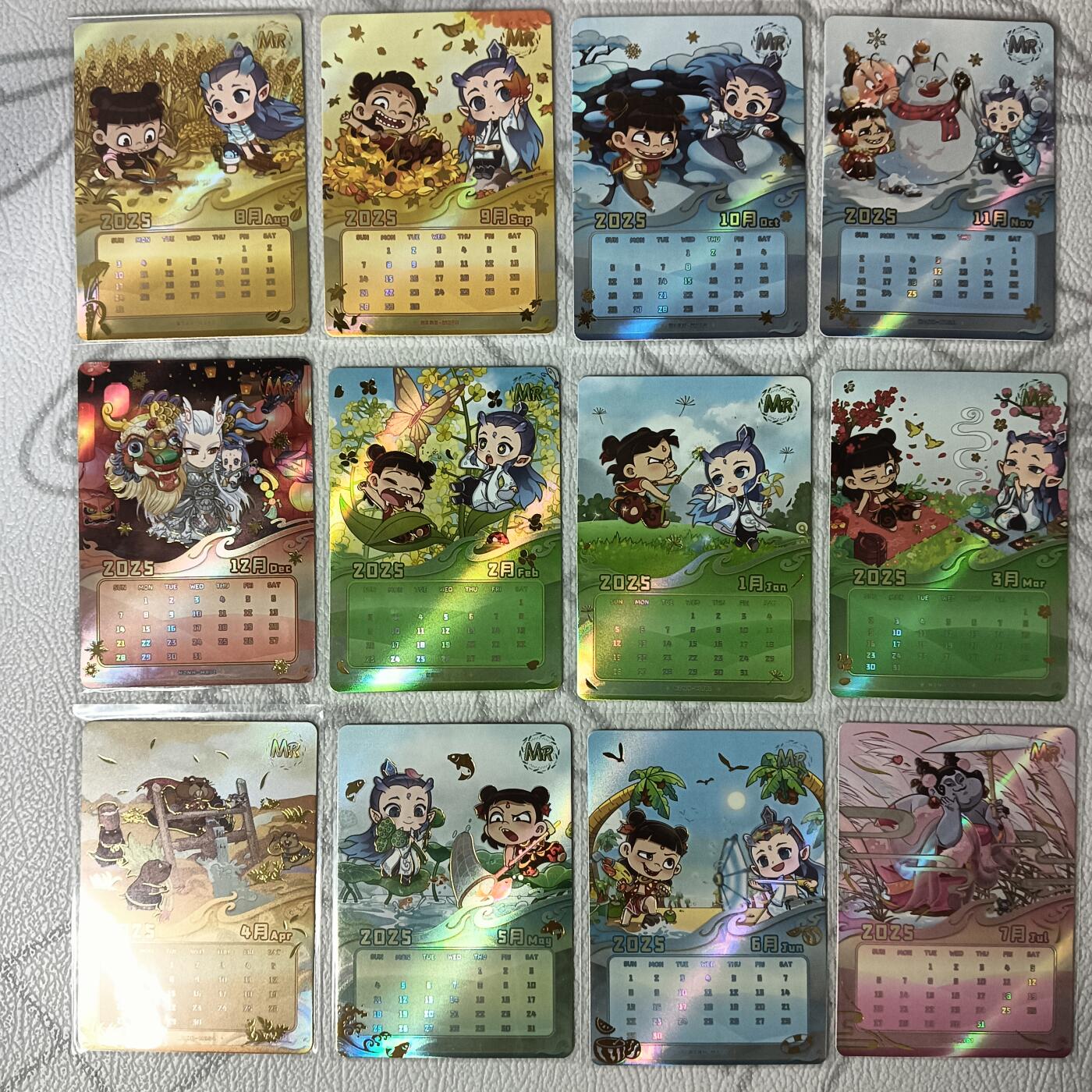 花开卡拍第35期（8月24号周日截拍，品控勿拍!!!拍品不寄存，运费5元，自制卡难免瑕疵，可能存在轻微撞角爆边等出厂瑕疵，品控介意勿拍！） 集卡社哪吒 月历卡 1套12张