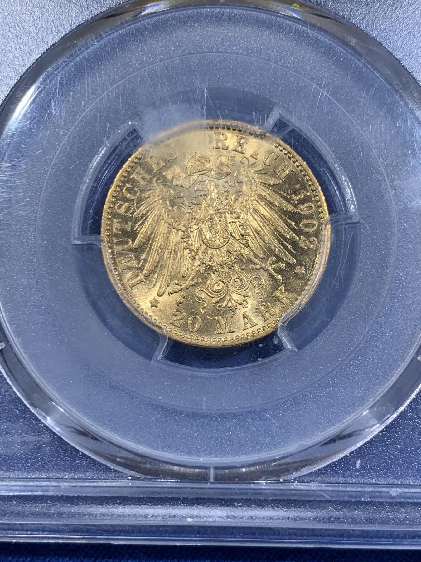 《竞宝斋》第411场 周日，周一，周二，3场连拍 （全场包邮） PCGS AU58 德国1902年普鲁士威廉二世国王长翅20马克金币 7.965克 痕迹柔和 非常漂亮 背面支撑架有磕 细节见图
