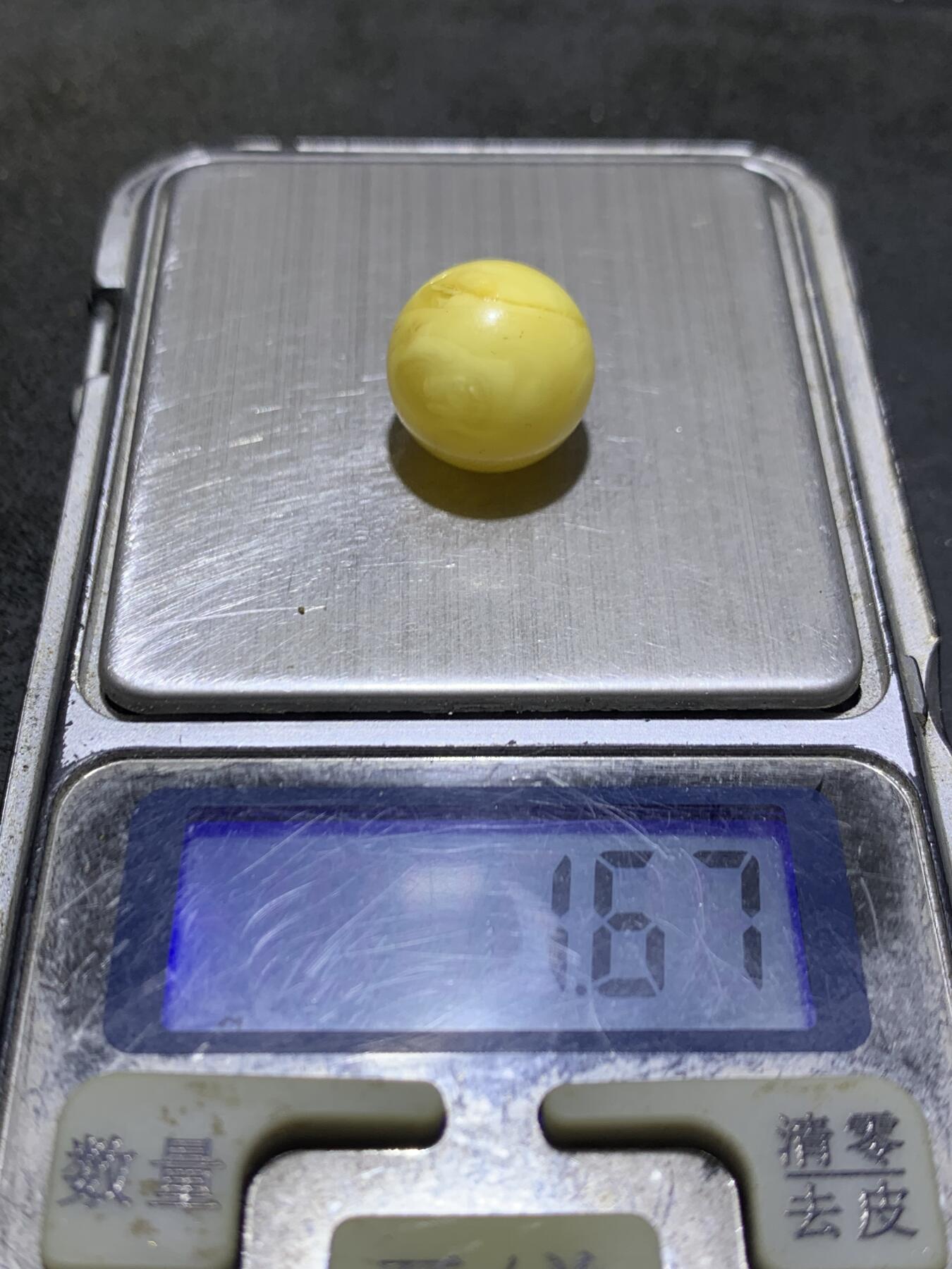 天然乌克兰原矿蜜蜡通货圆珠一颗，
