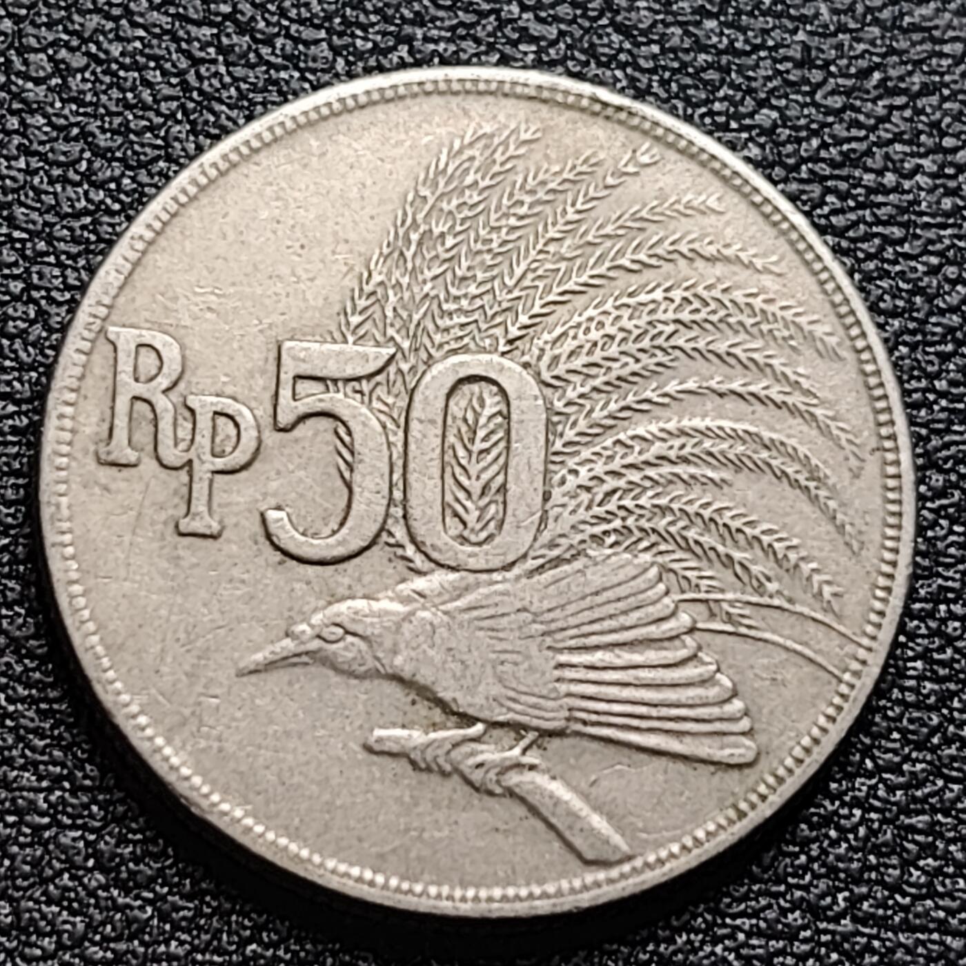 泉币菌-第95场-散币乐园场（满包邮条件，下周一发货） 印度尼西亚1971年 50卢比/盾 鹰徽天堂鸟 24mm