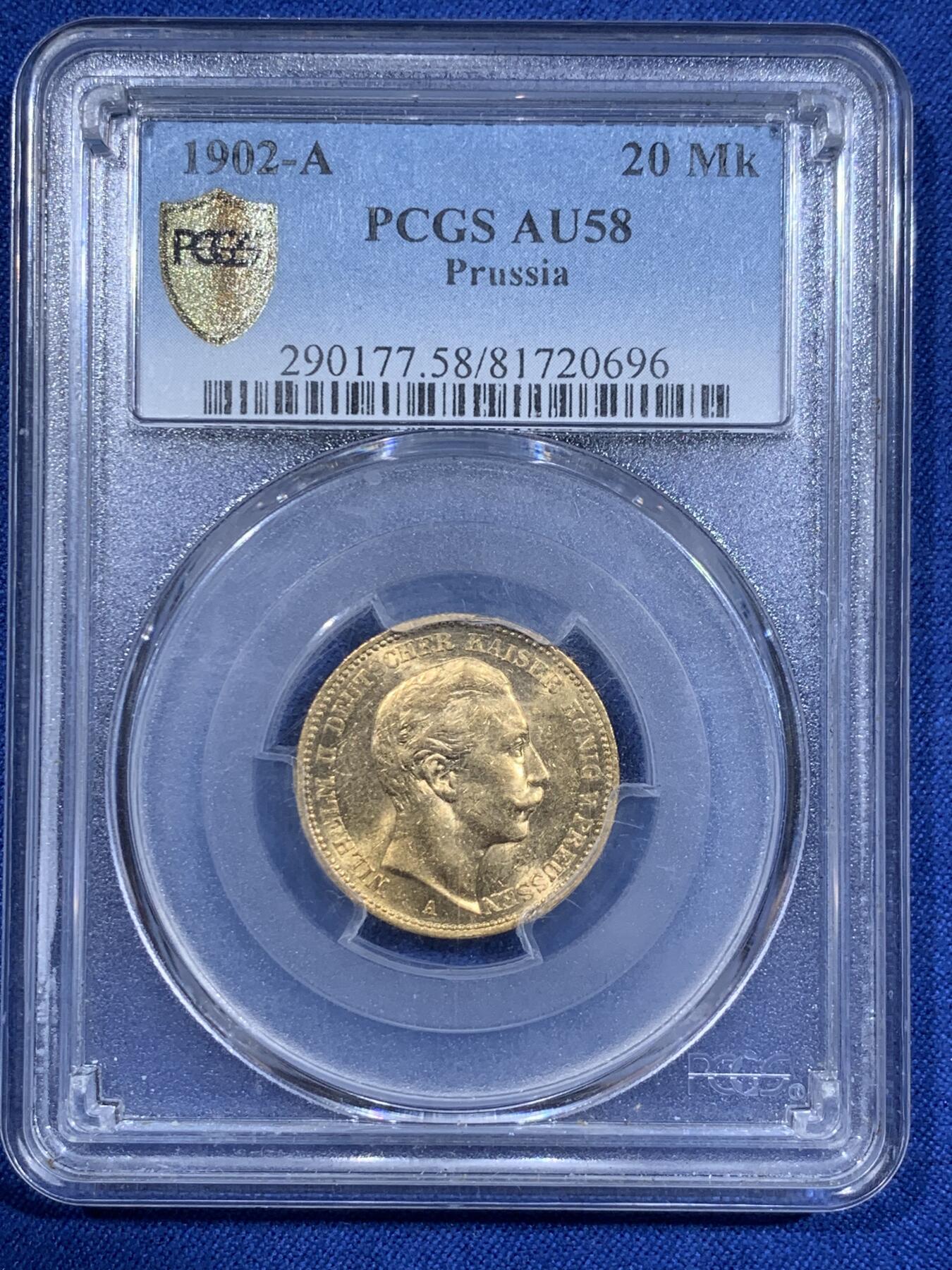 《竞宝斋》第411场 周日，周一，周二，3场连拍 （全场包邮） PCGS AU58 德国1902年普鲁士威廉二世国王长翅20马克金币 7.965克 痕迹柔和 非常漂亮 背面支撑架有磕 细节见图