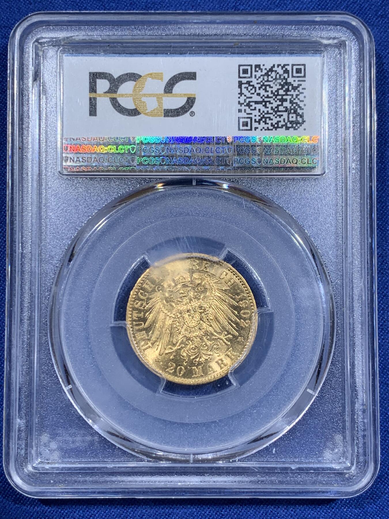 《竞宝斋》第411场 周日，周一，周二，3场连拍 （全场包邮） PCGS AU58 德国1902年普鲁士威廉二世国王长翅20马克金币 7.965克 痕迹柔和 非常漂亮 背面支撑架有磕 细节见图