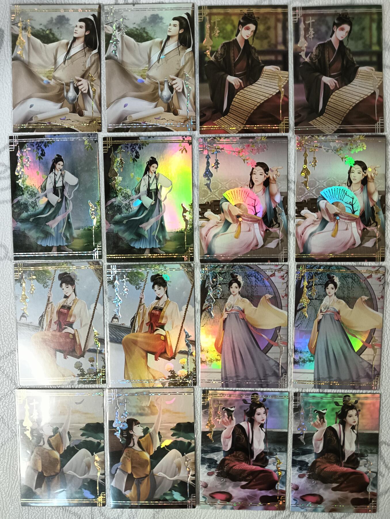 花开卡拍第35期（8月24号周日截拍，品控勿拍!!!拍品不寄存，运费5元，自制卡难免瑕疵，可能存在轻微撞角爆边等出厂瑕疵，品控介意勿拍！） 大圣卡通十年纪念卡 16张