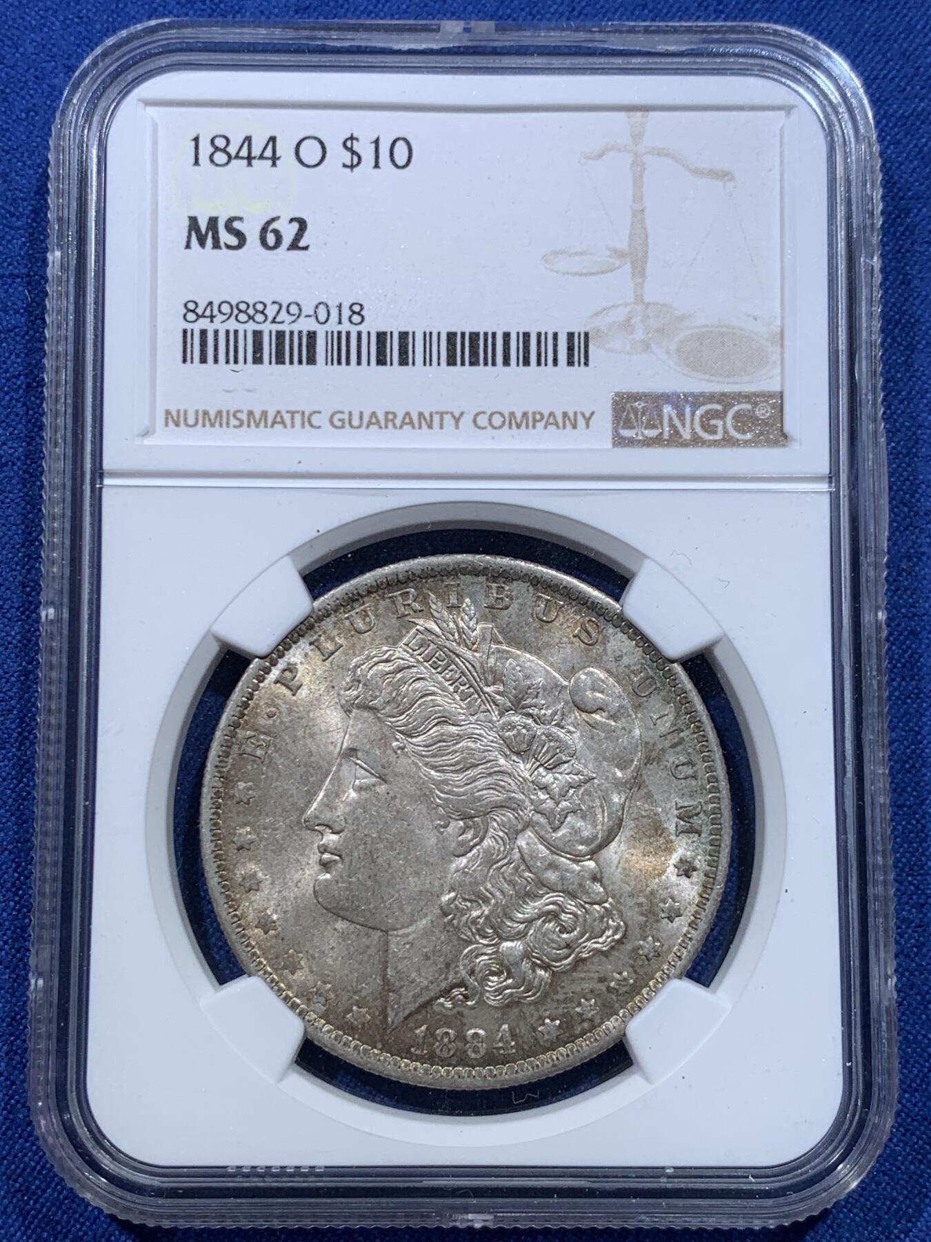 《竞宝斋》第412场 周日，周一，周二，3场连拍 （全场包邮） NGC MS62 美国1884年摩根银币，原光带彩好品 标签年份错误 N可以免费更换