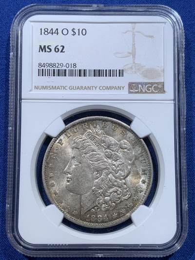 《竞宝斋》第412场 周日，周一，周二，3场连拍 （全场包邮） - NGC MS62 美国1884年摩根银币，原光带彩好品 标签年份错误 N可以免费更换