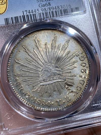 《竞宝斋》第412场 周日，周一，周二，3场连拍 （全场包邮） PCGS UNC 1884年墨西哥鹰洋大银币 黄油车轮光，有寓意极好的全字戳，观感极佳