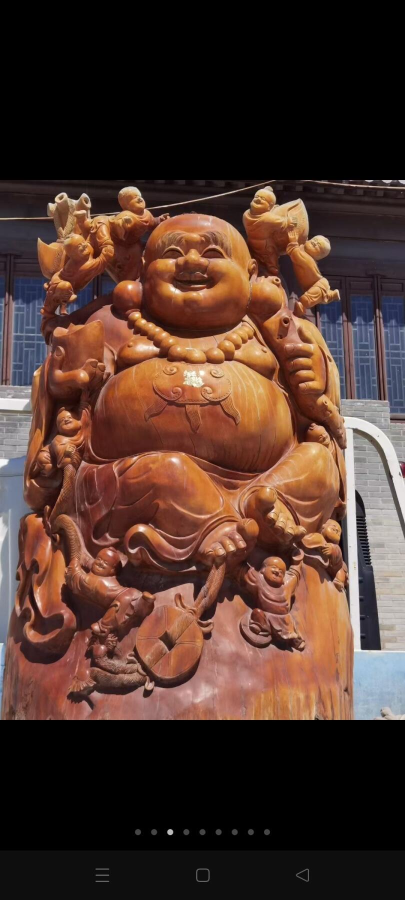 上千年杜梨树，一木整雕，，九子弥勒佛像一尊，完整大气，九子佛寓意，吉祥乐观，豁达慈悲宽容，福气平安，以祈求美好明天。重一吨多