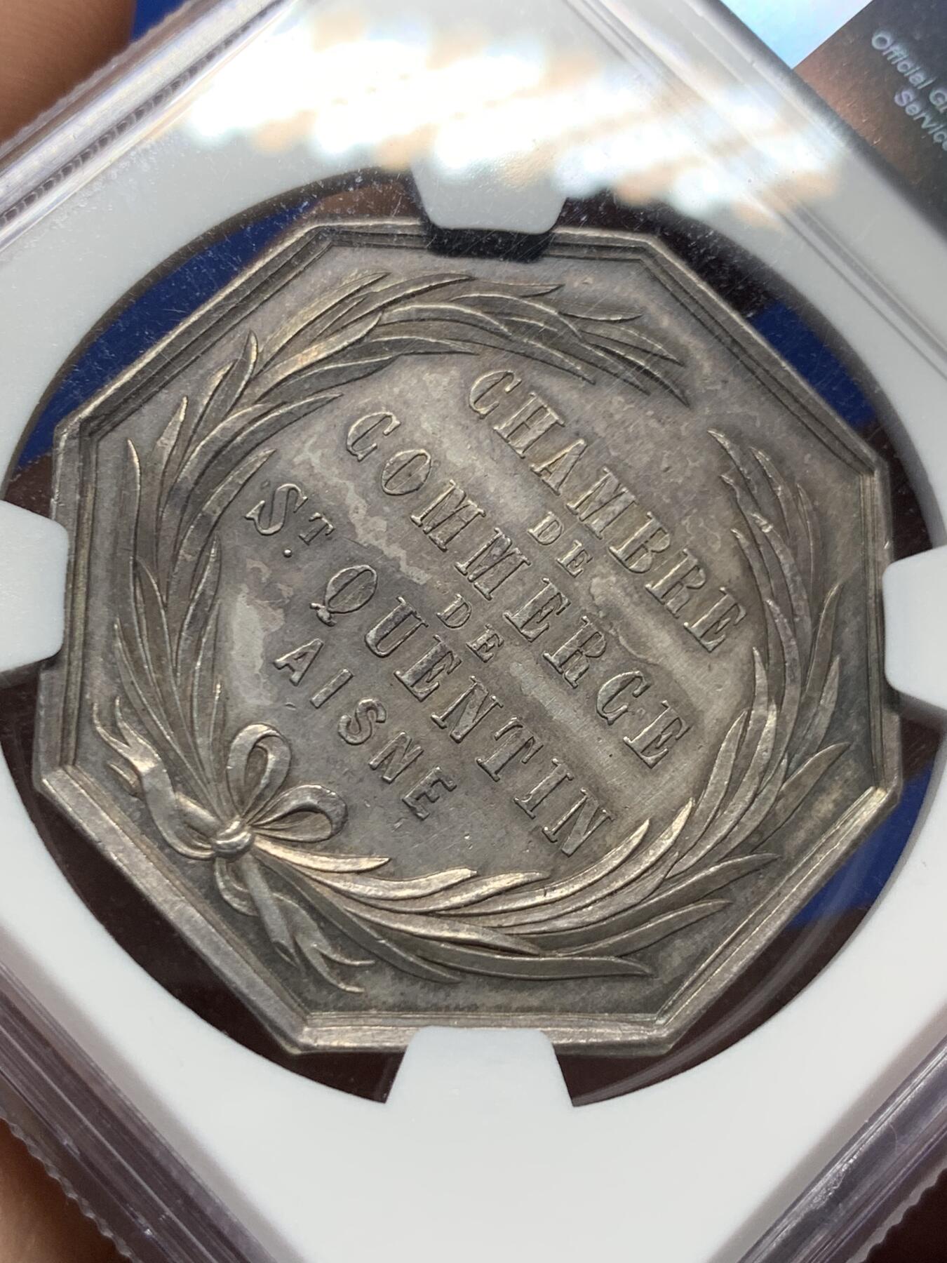 《竞宝斋》第413场 周日，周一，周二，3场连拍 （全场包邮） NGC MS61法国圣昆廷艾商会八角银章，34MM，22克早期手指边铭的非常稀少