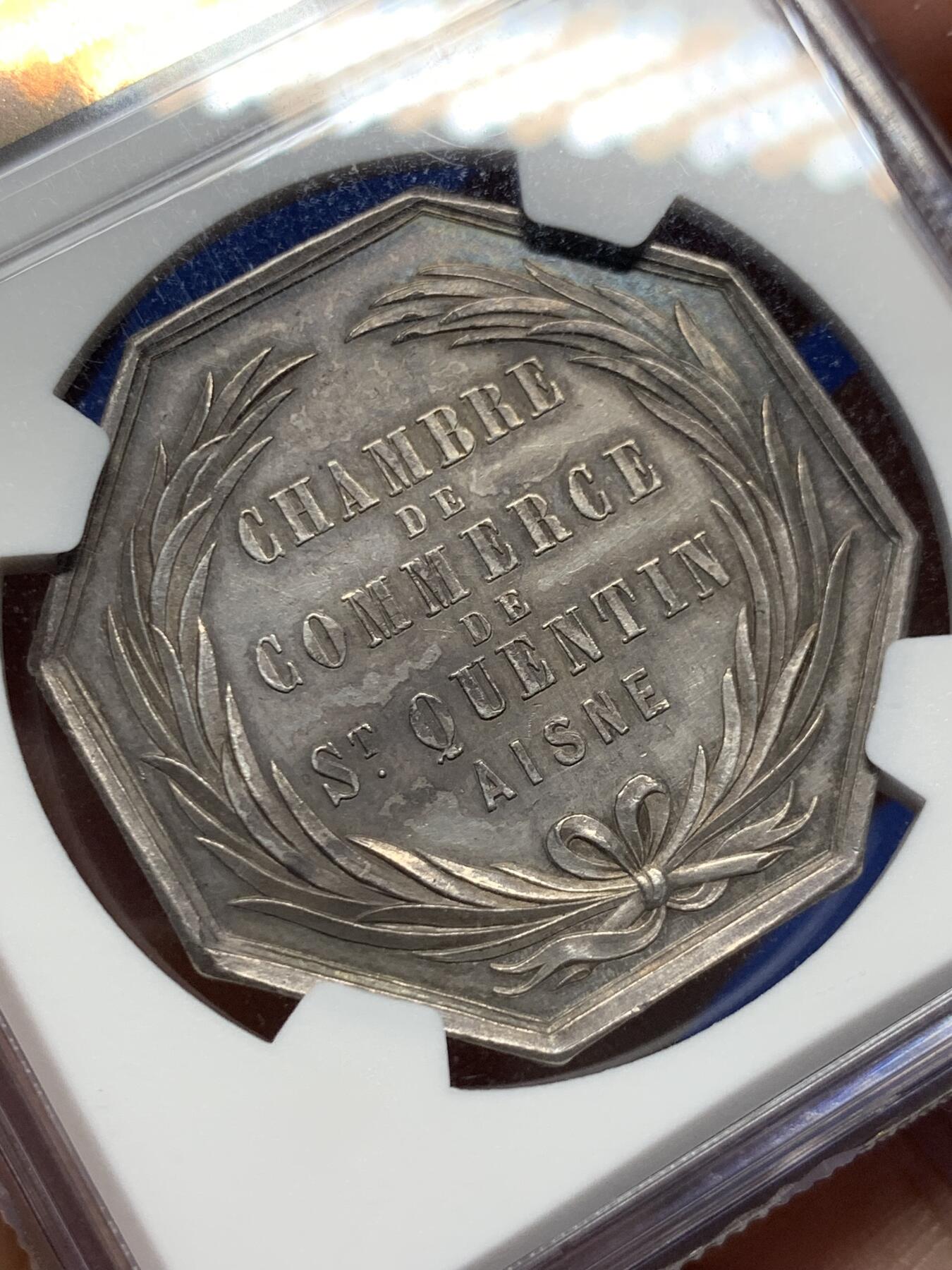 《竞宝斋》第413场 周日，周一，周二，3场连拍 （全场包邮） NGC MS61法国圣昆廷艾商会八角银章，34MM，22克早期手指边铭的非常稀少