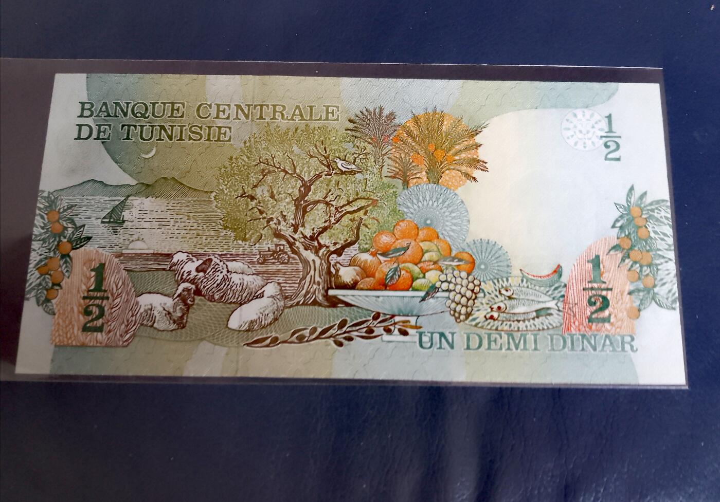 全新突尼斯1973年A冠1/2第钠尔超级靓品纸币