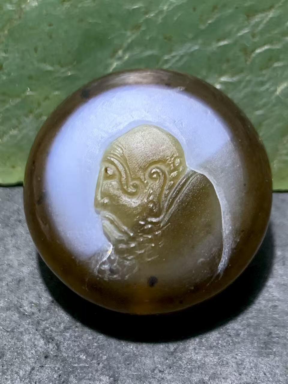 精品天眼纹药师玛瑙手工雕刻达摩祖师板珠（背云）一颗。