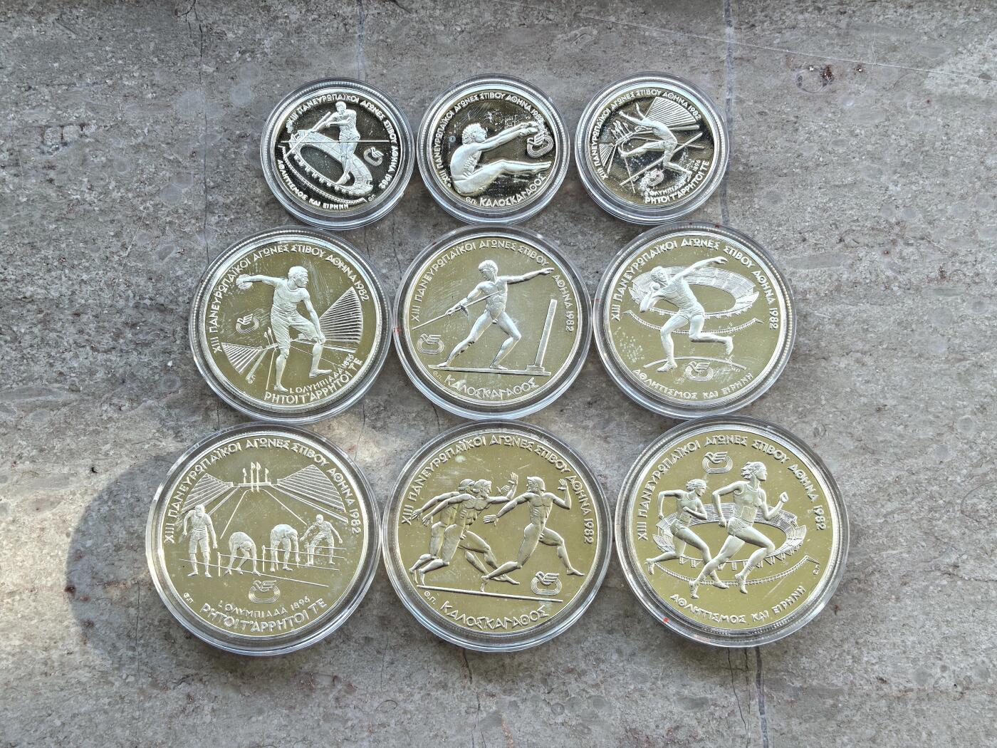 博洋堂世界钱币拍卖第136期（全场包邮） 1982年希腊发行泛欧运动会银币套 共9枚 3组100/250/500德拉克马 147.3克900银 盒证全