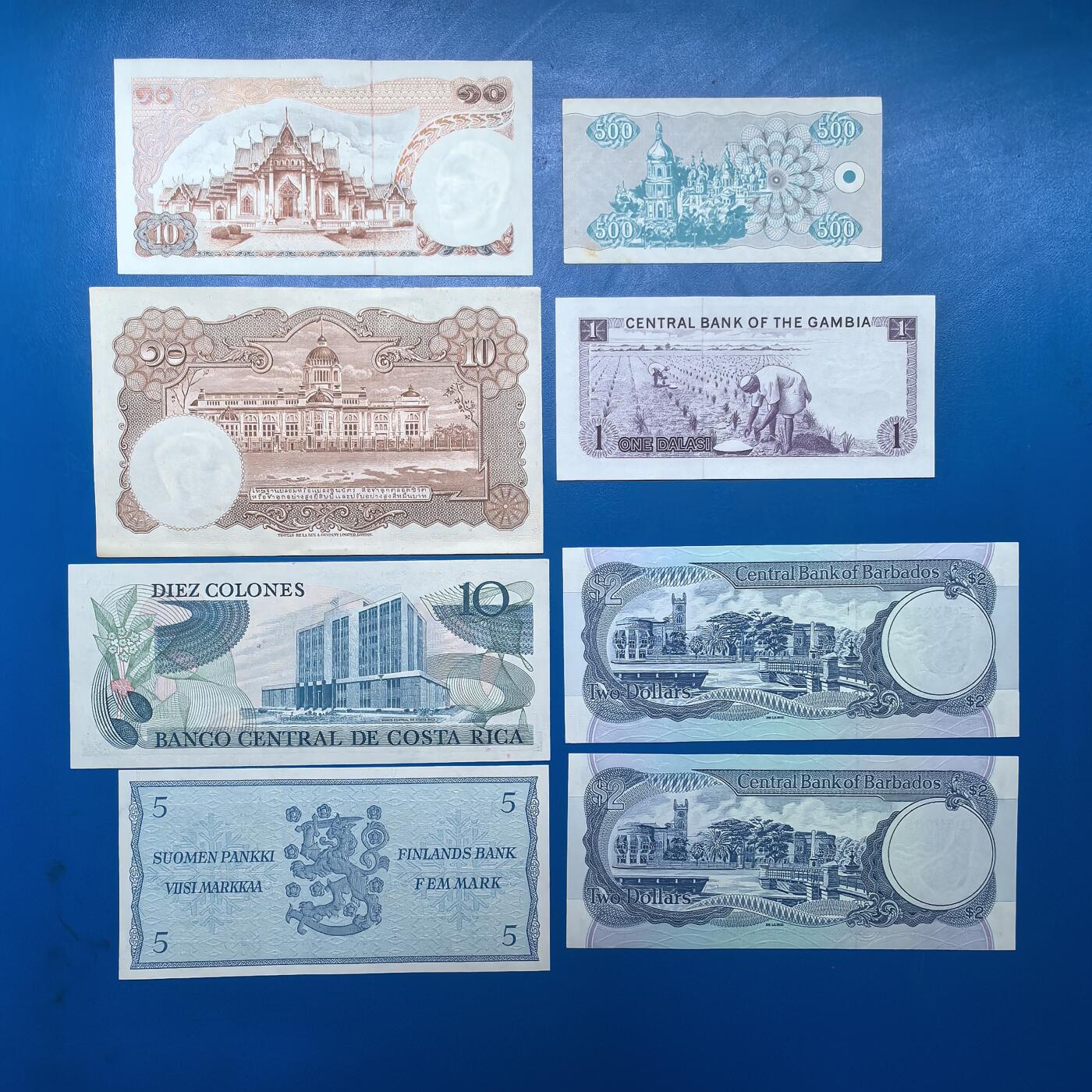 各国外币第91期 泰国哥斯达黎加芬兰乌克兰冈比亚巴巴多斯 8张unc 泰国乌克兰微黄