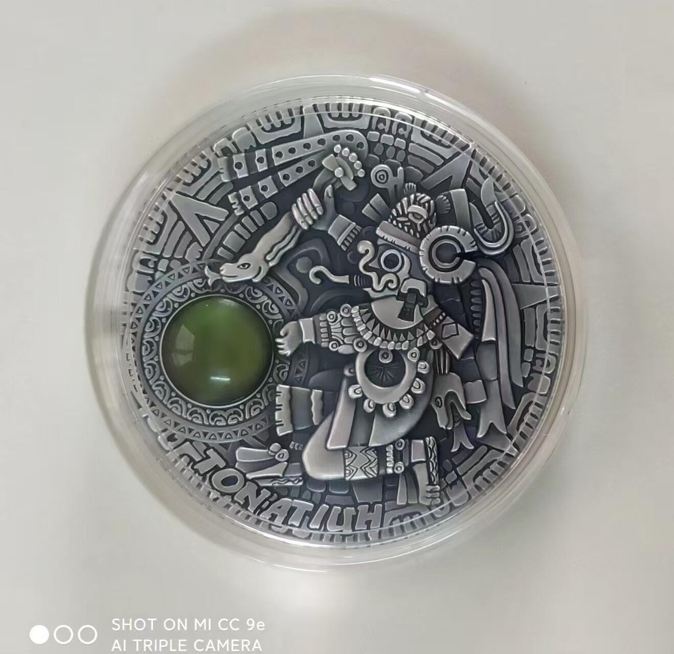第172期拍卖【长期征集拍品】  【龙头币】纽埃2020,太阳神(1)-托纳帝乌, 2盎司、镶嵌橄榄石、超高浮雕、激光镭射纹字、仿古银币. 龙头币 (新太阳神系列第一枚),盒证全,国外涨幅榜热门.(国外售价390欧元)