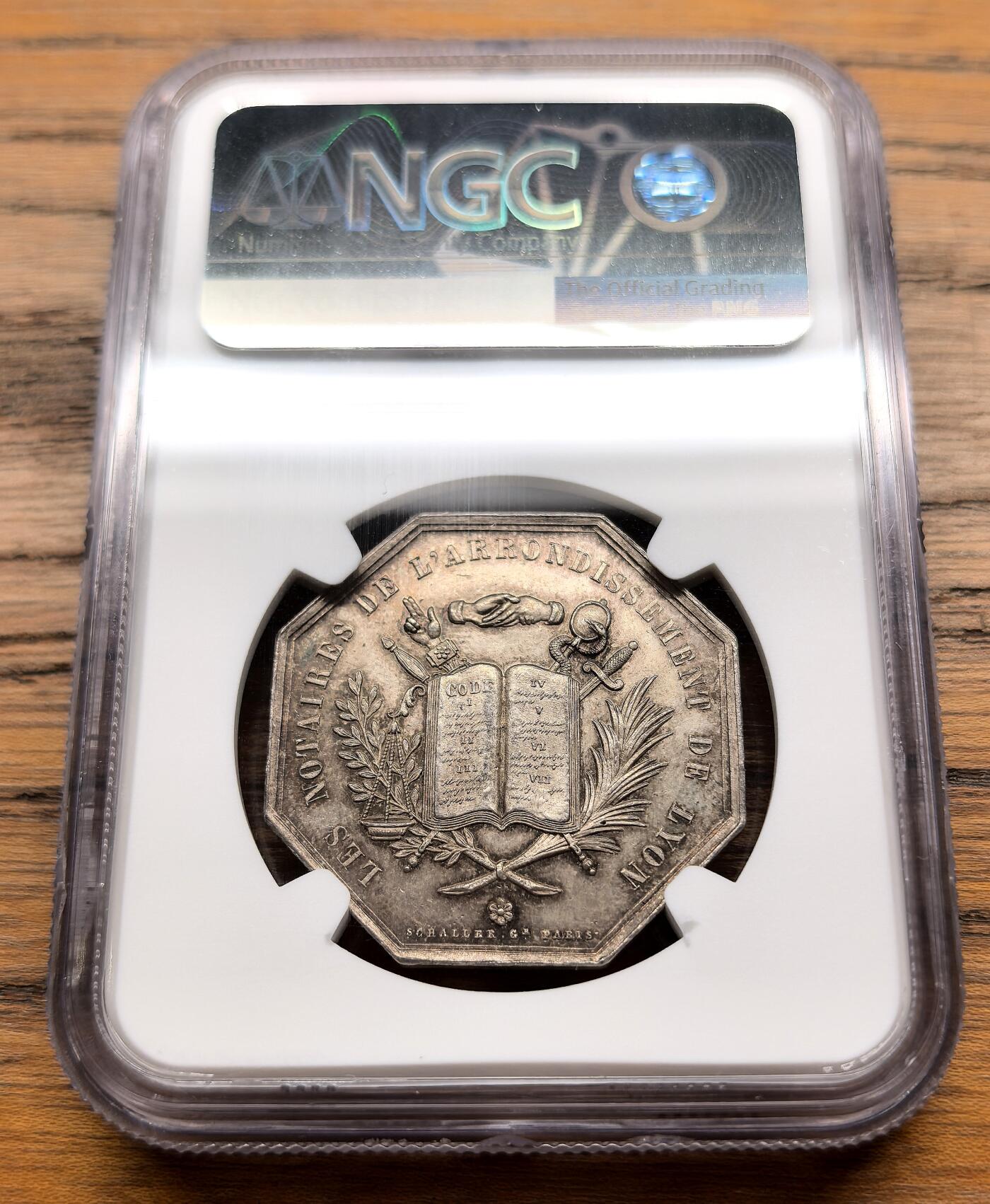 凡希社世界钱币微拍月度大拍（2025/8） 1883法国里昂公证处八角银章NGC-MS63，原味灰彩。