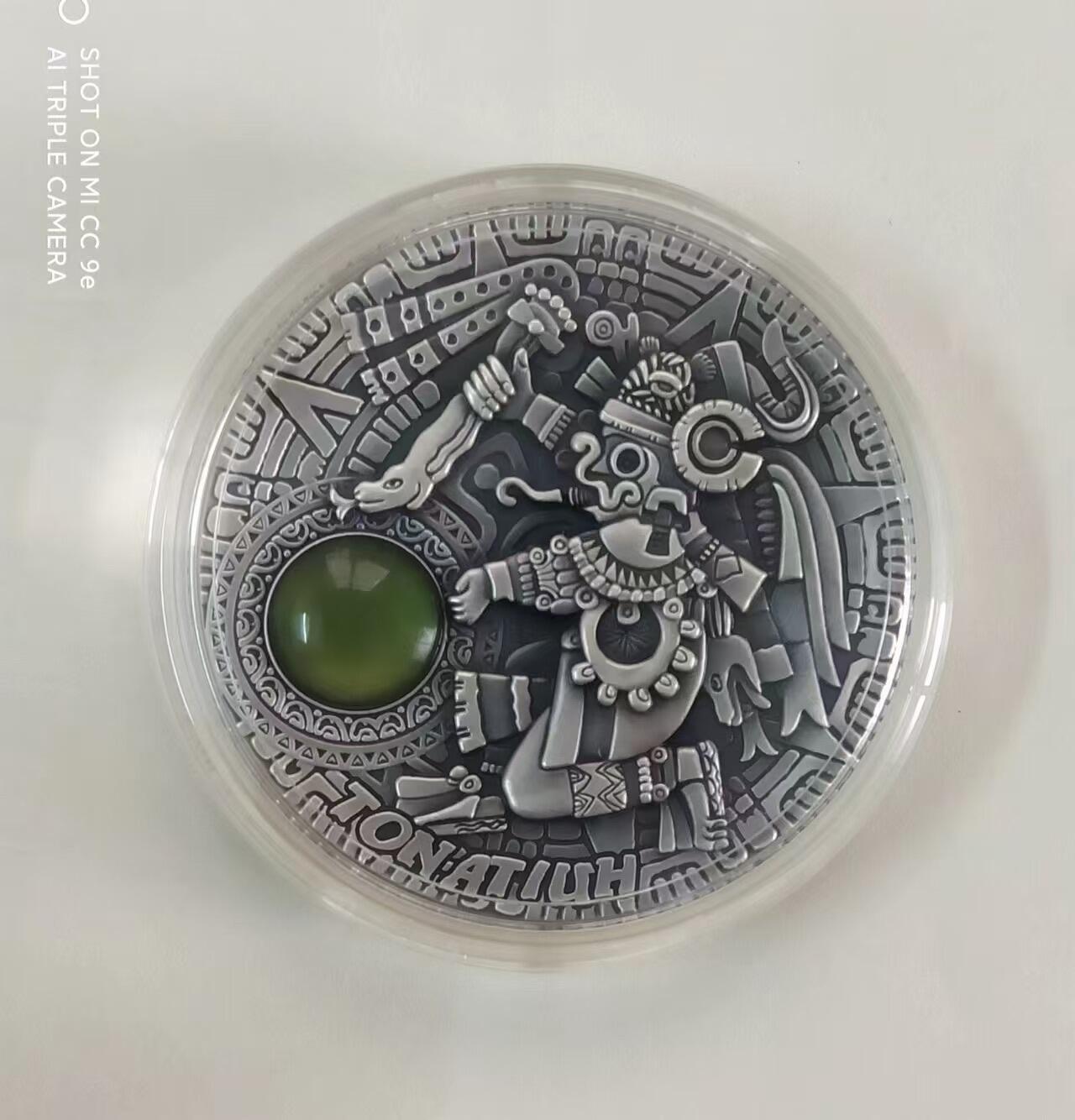 第172期拍卖【长期征集拍品】  【龙头币】纽埃2020,太阳神(1)-托纳帝乌, 2盎司、镶嵌橄榄石、超高浮雕、激光镭射纹字、仿古银币. 龙头币 (新太阳神系列第一枚),盒证全,国外涨幅榜热门.(国外售价390欧元)