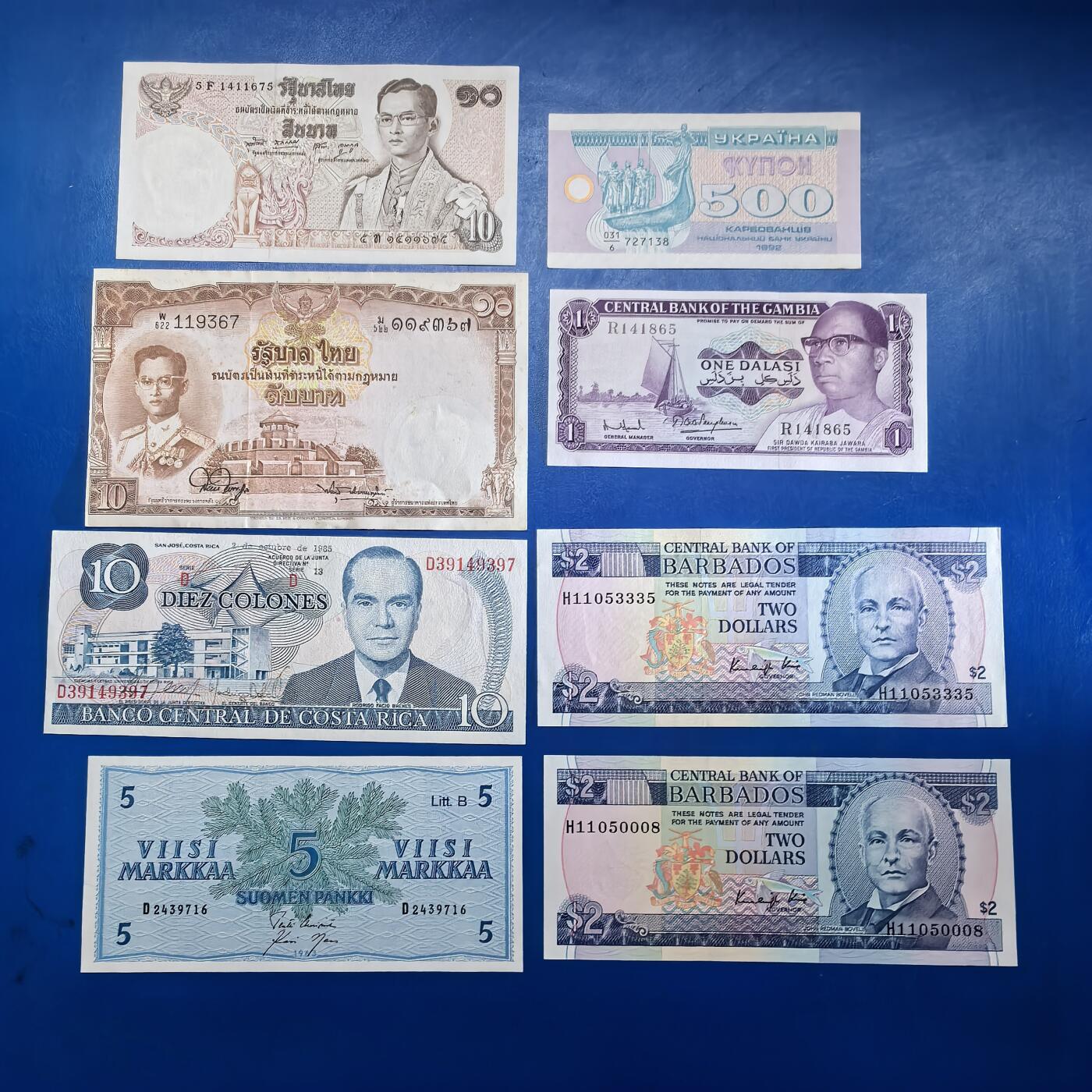 各国外币第91期 泰国哥斯达黎加芬兰乌克兰冈比亚巴巴多斯 8张unc 泰国乌克兰微黄