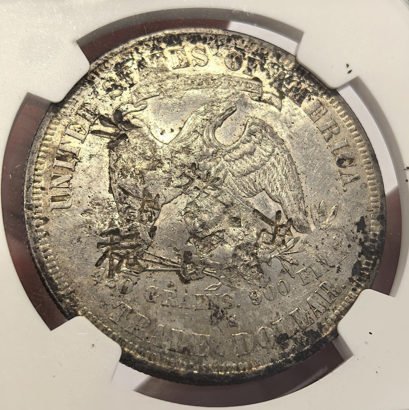 博洋堂世界钱币拍卖第136期（全场包邮） NGC CHOPMARKED 美国贸易银1877s，AU底板有多个清晰汉字戳记和画押，美国贸易银（拿花）作为晚清流入广东福建一带的银元被钱庄打戳才能使用，随着拿花被回收，这些打戳的拿花也成了历史。