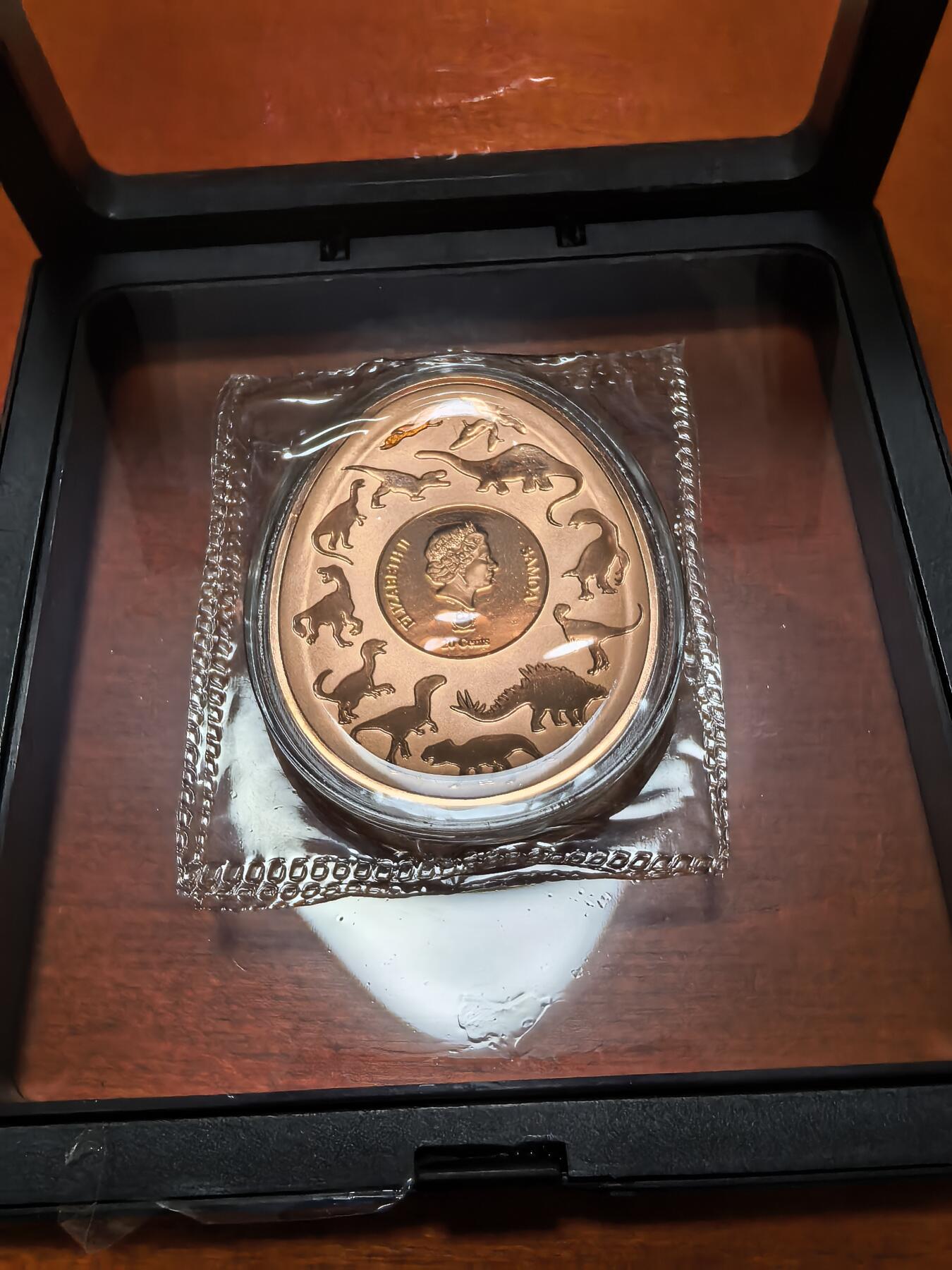 长老汇蛇年精选第四十一场拍卖 2022萨摩亚恐龙系列之翼龙20分椭圆形镀金精制铜币，盒证全，6500枚