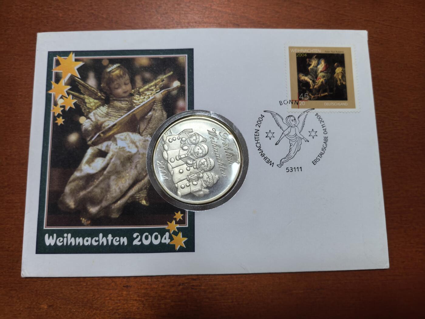 长老汇蛇年精选第四十一场拍卖 2004德国平安夜邮币封首日封，含平安夜曲谱银章1枚，21.67克，40MM