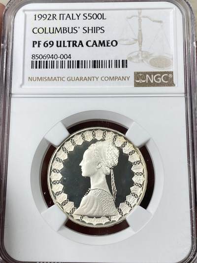 万国钱币拍卖第052期 - NGC PF69UC 1992年意大利帆船少女精制500里拉银币 深度黑色镜面底板 高浮雕满喷砂