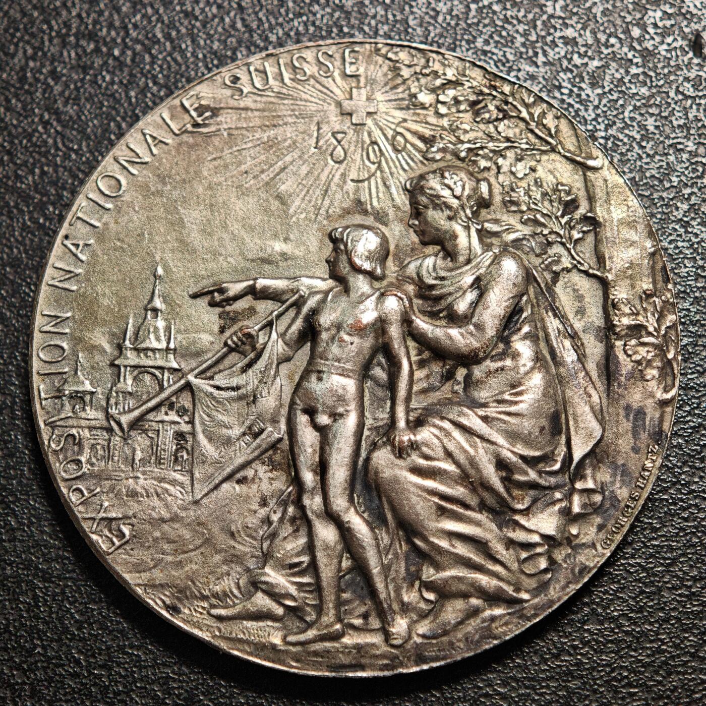 【德藏】世界币章拍卖第144期（拍品征集中~欢迎藏友联系） 1896年 瑞士日内瓦国家博览会镀银纪念章 图案立体 少见品种 直径约：44.9mm；重约：37.4g