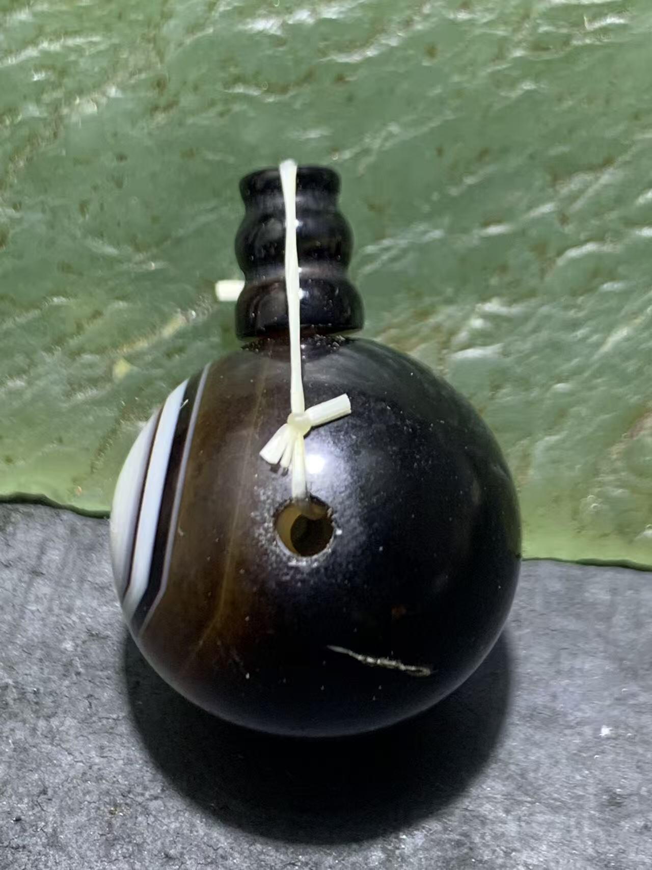 天眼纹药师玛瑙通货佛头三通一套，