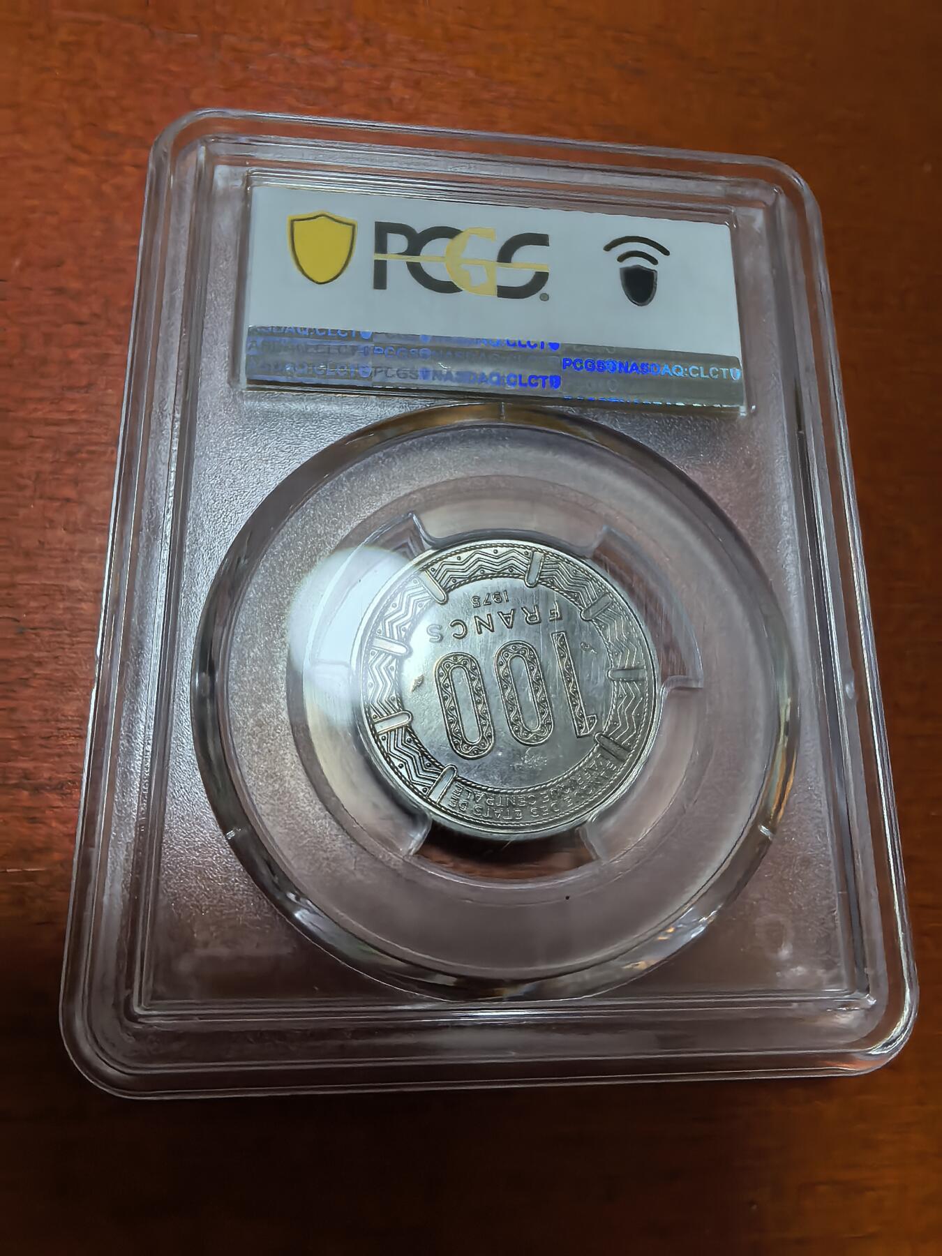 长老汇蛇年精选第四十二场拍卖 1975 中非共和国P100 法郎镍样币，PCGS SP66分，更高13枚，1700枚