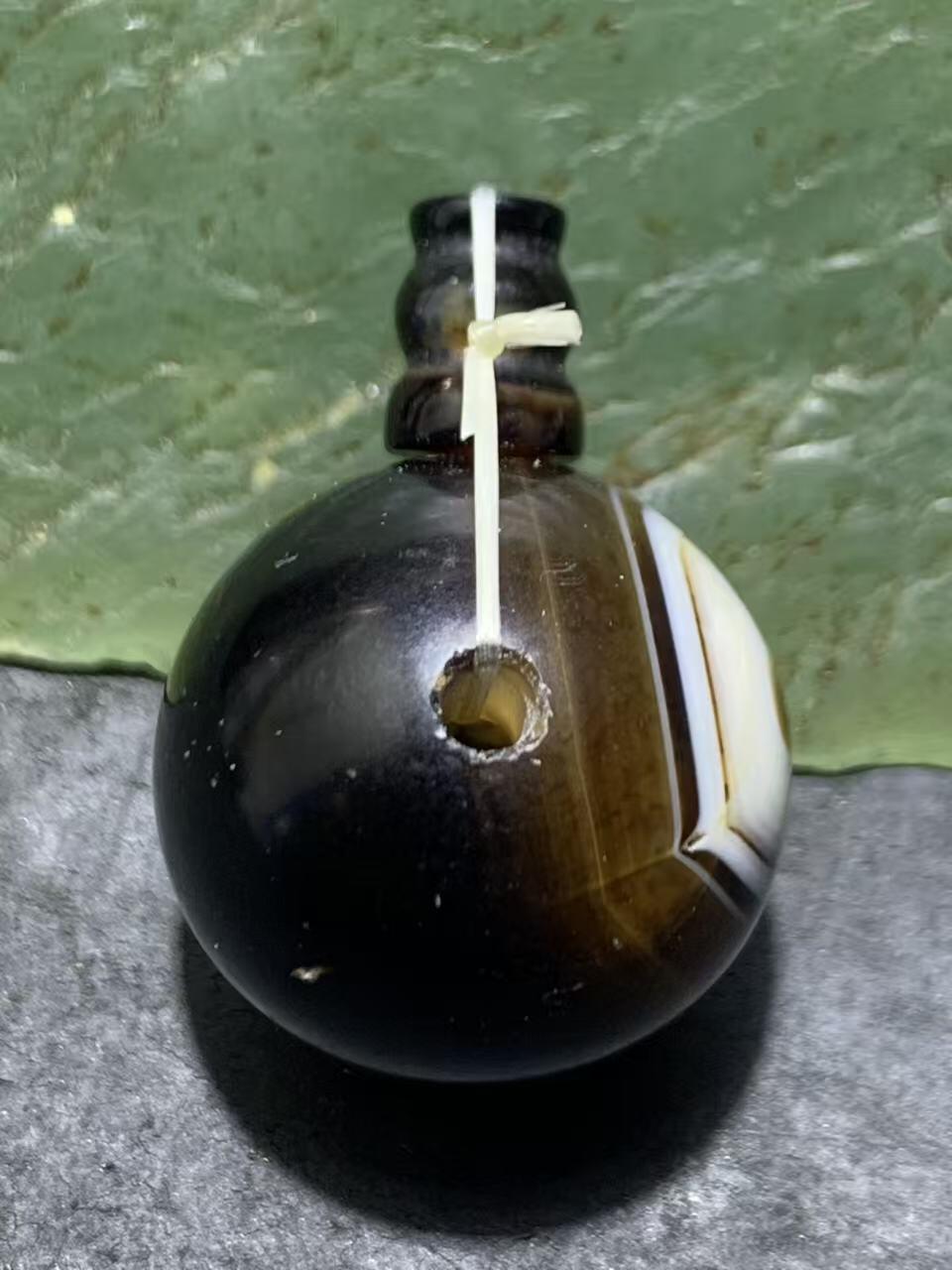 天眼纹药师玛瑙通货佛头三通一套，