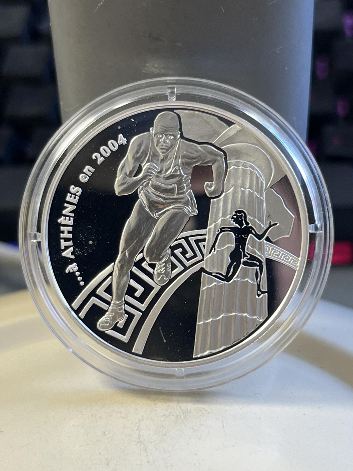 第173期拍卖【长期征集拍品】 法国2003年顾拜旦纪念精制银币，900银，22.2克，有瑕疵
