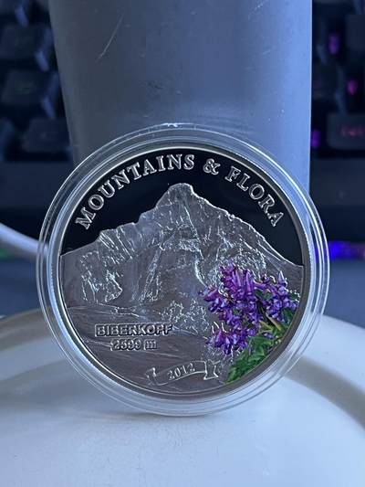 第173期拍卖【长期征集拍品】 - 帕劳2012年biberkopf高峰植物花朵彩色纪念银币，20克，925银，发行量2500枚