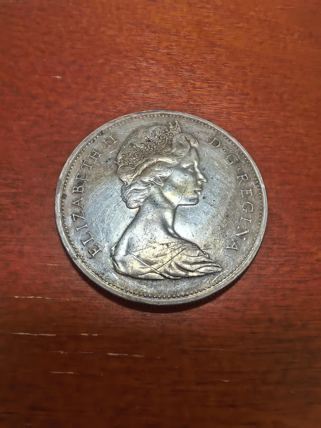长老汇蛇年精选第四十二场拍卖 1965加拿大划船1元银币，23.33克800银，版本众多
