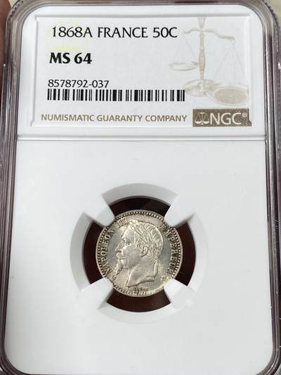 万国钱币拍卖第052期 - NGC MS64 1868年法国拿破仑三世50分皇冠银币 顶级十字转光收藏级