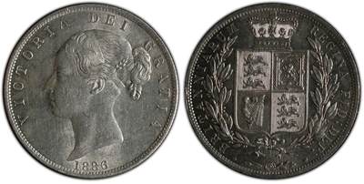万国钱币拍卖第052期 - PCGS MS63 1886年英国维多利亚女皇盾徽版1/2半克朗银币 经典小维青年头像 高分克朗价格已是高不可攀 银霜转光高点极佳