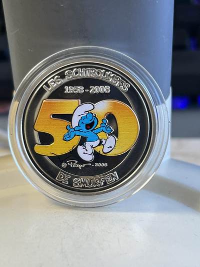 第174期拍卖【长期征集拍品】 - 比利时2008年卡通蓝精灵诞生50周年精制彩银币，925银，发行25000枚，14.6克，有氧化