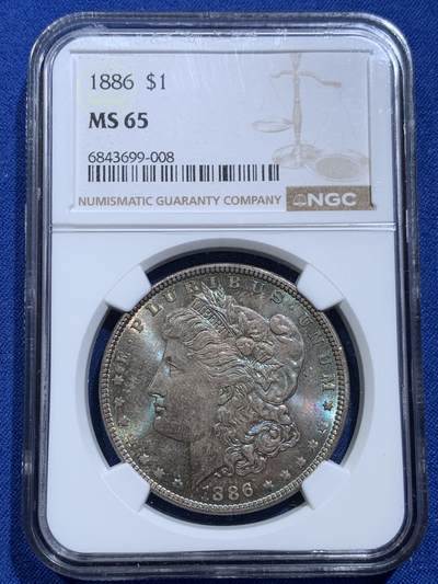 《竞宝斋》第414场 周日，周一，2场连拍 （全场包邮） - NGC MS65 美国1886年摩根1美元银币 正面覆盖蓝彩色包浆