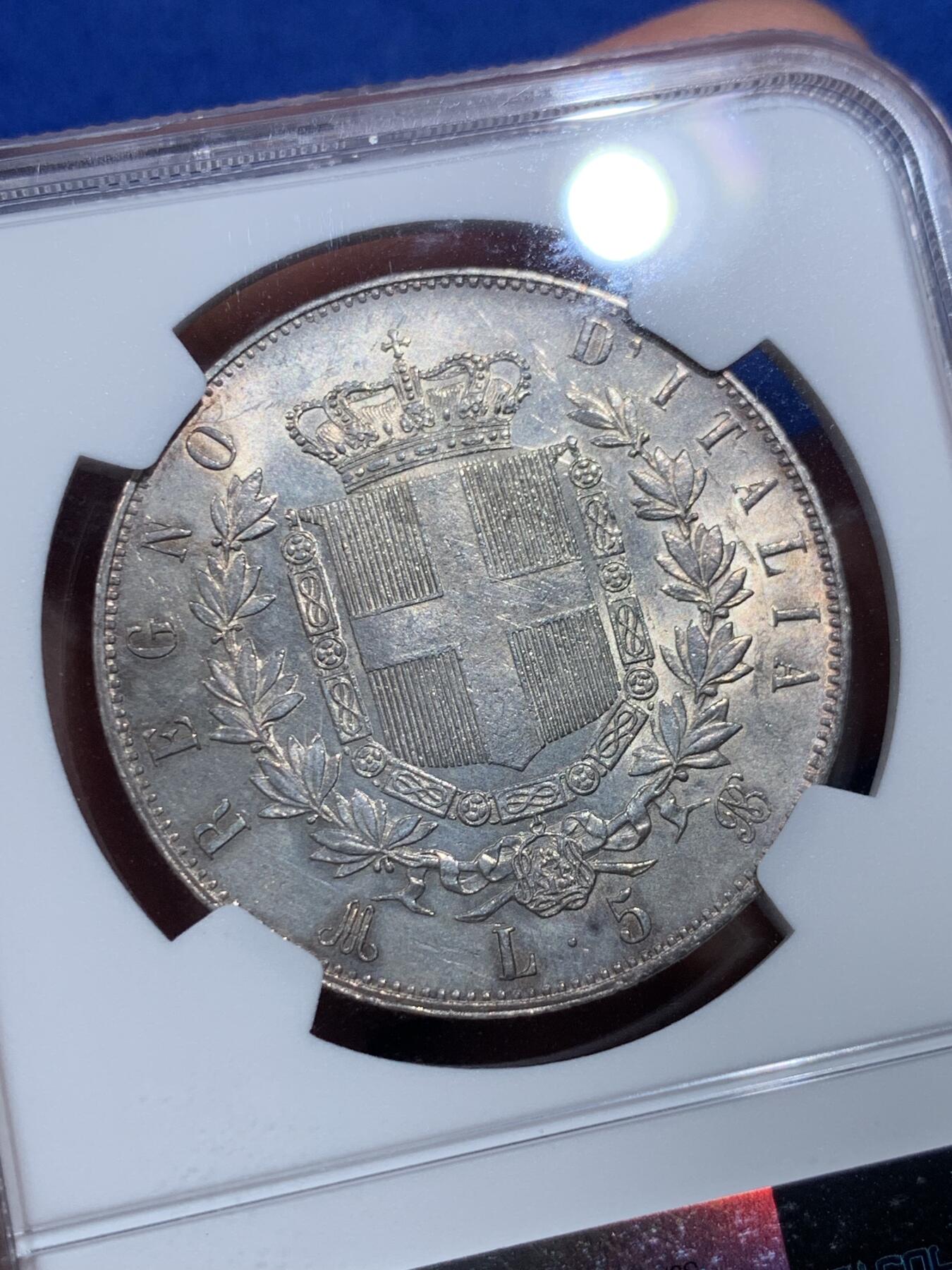 《竞宝斋》第415场 周日，周一，2场连拍 （全场包邮） NGC MS63 意大利1875M埃曼努尔二世流通5里拉大银币，淡金彩，米兰厂出品。意系流通主币大银，高分难遇，更高分仅有4枚。同年一枚64+稀奇5201元不含佣金成交。