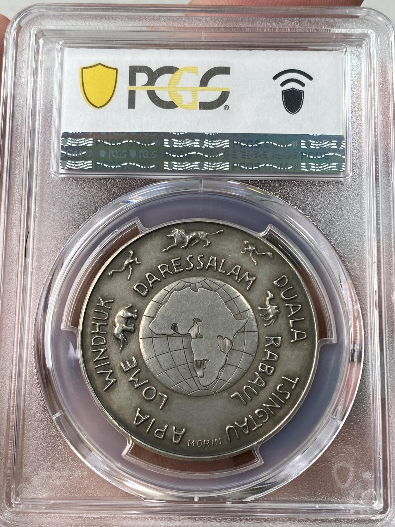 万国钱币拍卖第052期 PCGS SP62 1933年德国民族社会主义工人党纪念帝国殖民地50周年银章 背面一圈为当时帝国殖民地所在地 其中包含中国青岛 原味天鹅绒彩